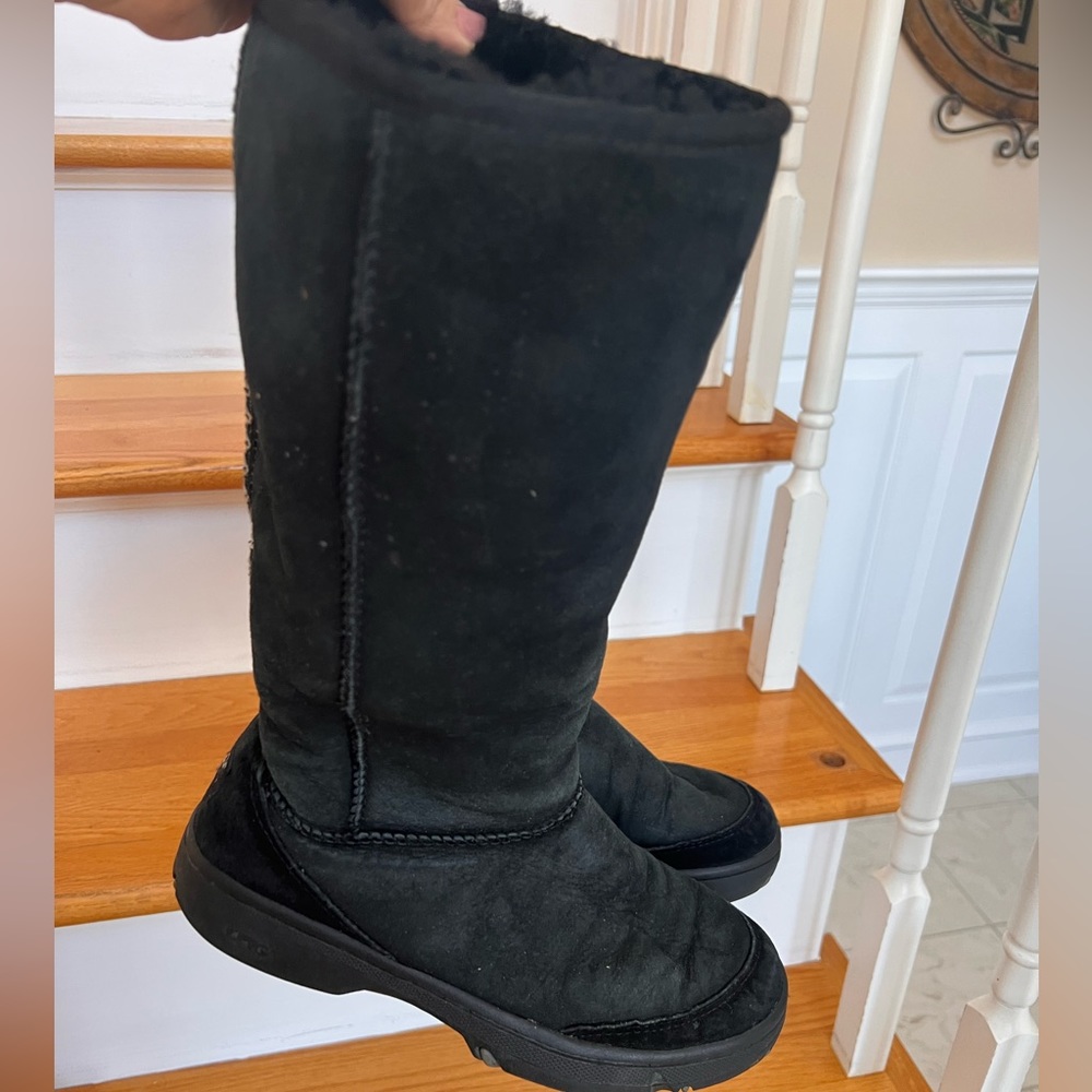 UGG’s boots. Black with striped stitching